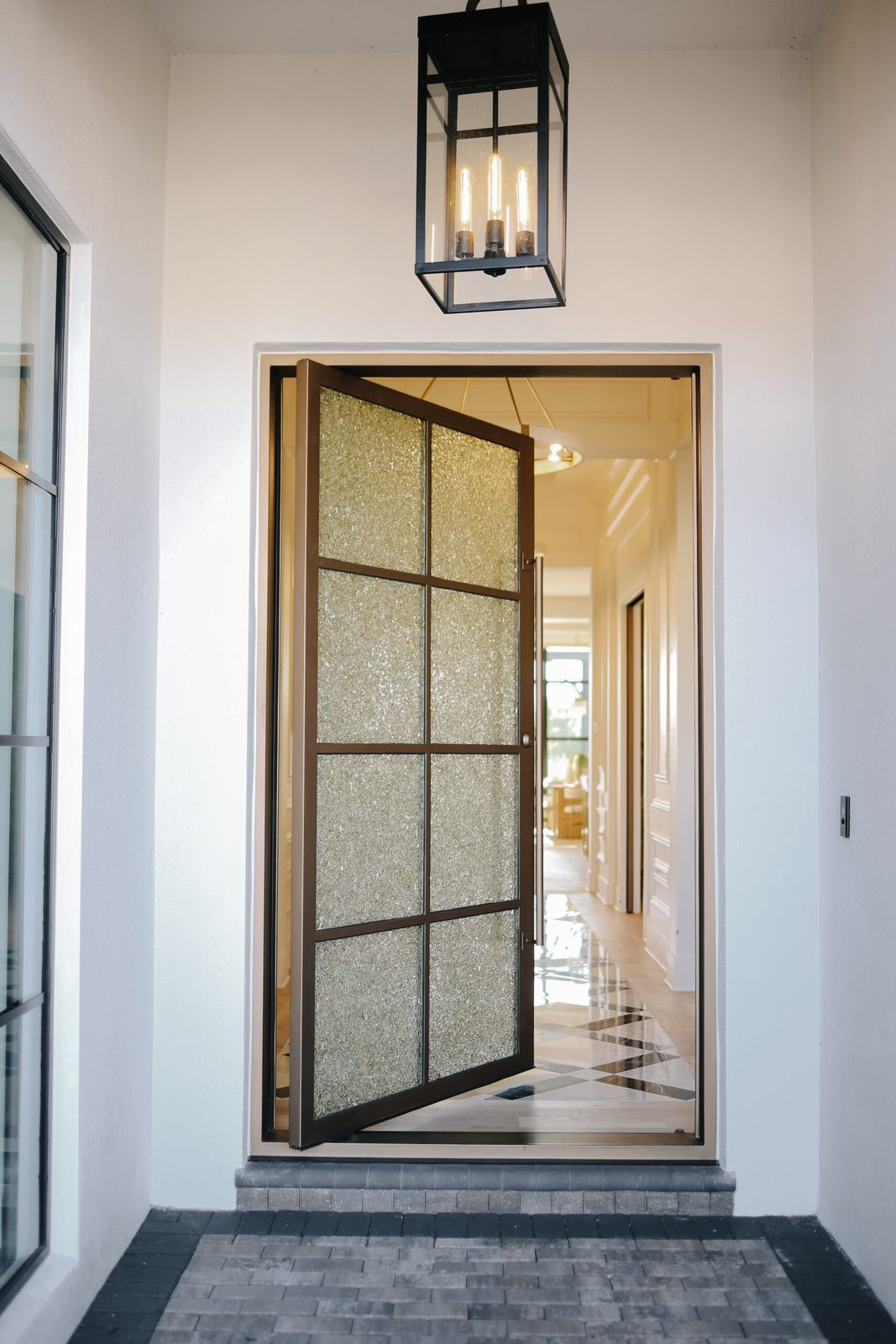 Pivot iron door — Gold finish