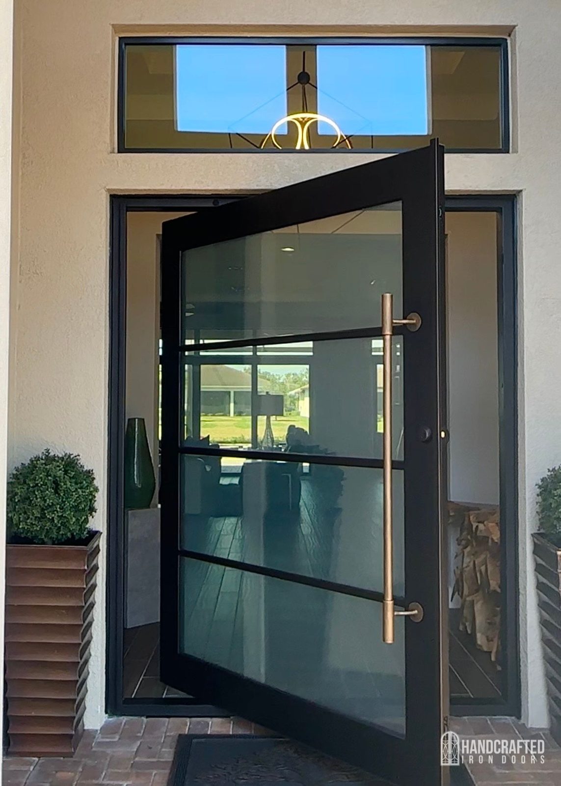 Pivot iron door — Rectangular, gold handle