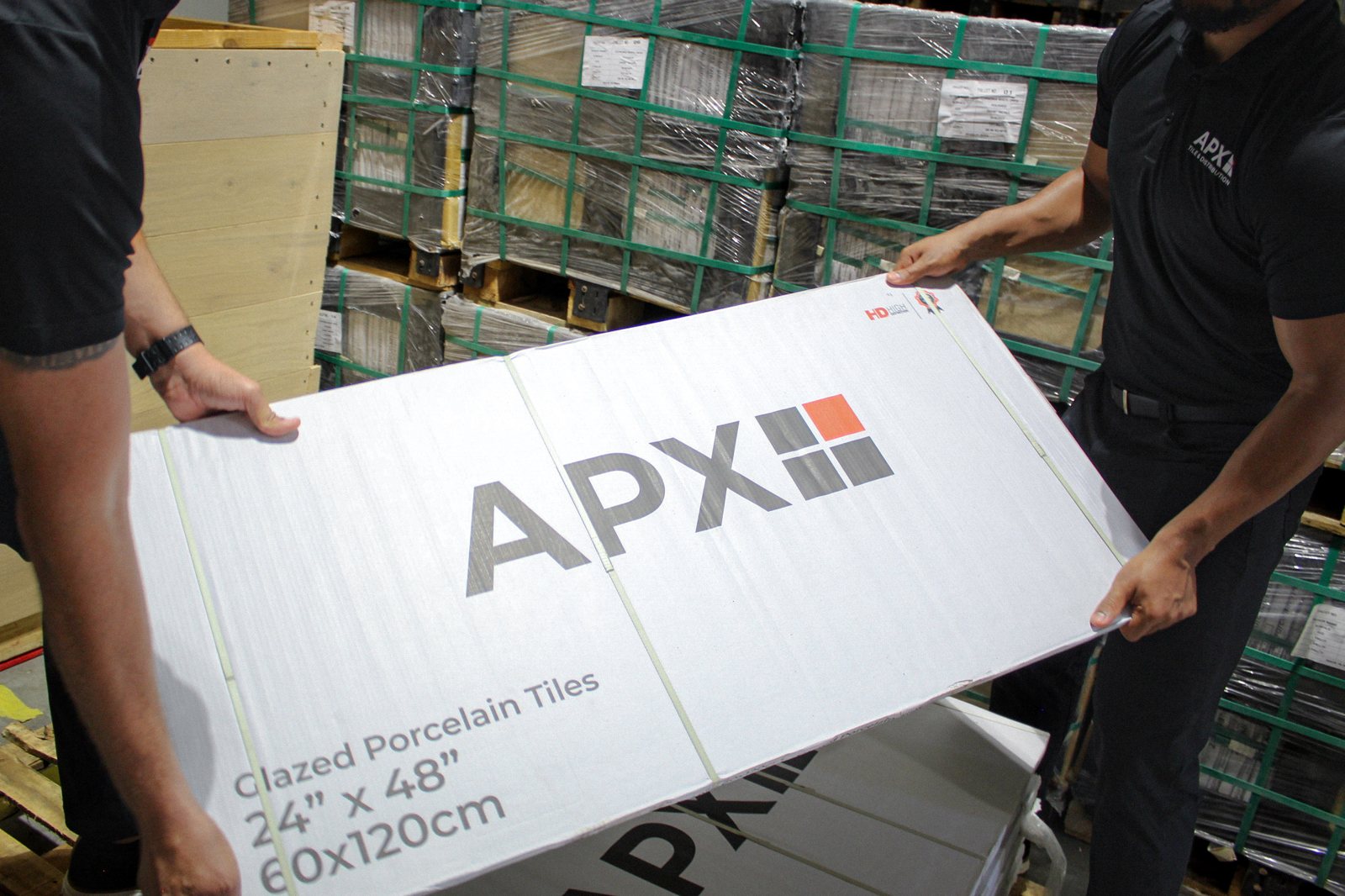 APX loading palletized tile freight for wholesale distribution